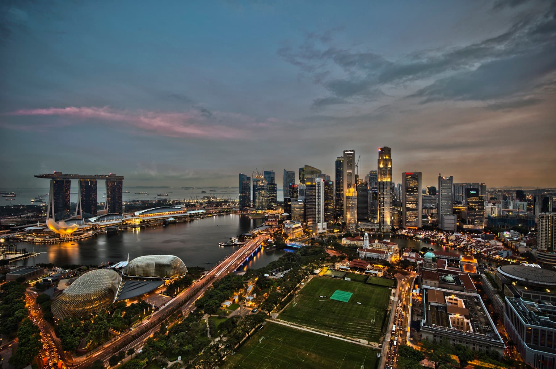 City skyline and waterfront at dusk